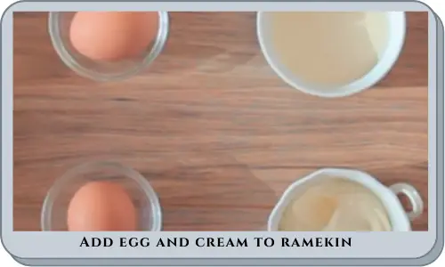 Add egg and cream to ramekin