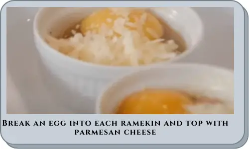 Break an egg into each ramekin and top with parmesan cheese