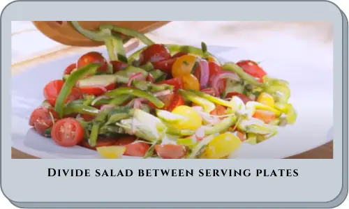 Divide salad between serving plates