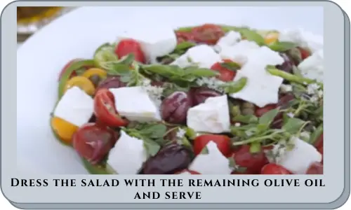 Dress the salad with the remaining olive oil and serve