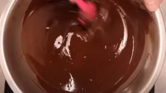 melt choclate syrup and butter until smooth