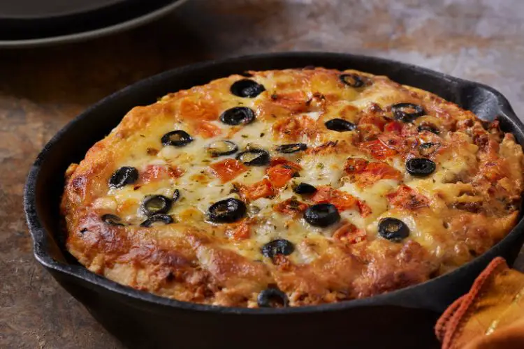 reheating pizza on a skillet